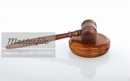 gavel with small reflection in front white background