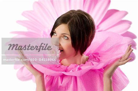 nice and funny shot of a young and cute girl in pink with flower in mouth looking away