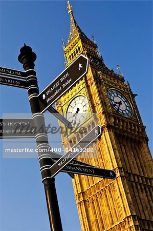 Big Ben clock tower with signpost in London