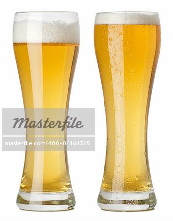 Photo of two tall glasses of beer, one with condensation and one without. Clipping path included. Two photographs merged. Photo of two tall glasses of beer, one with condensation and one without. Clipping path included. Two photographs merged.