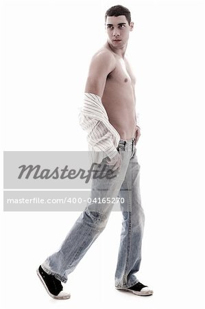 Stylish model show his chest in open shirt and jean, side pose in isoalted white background