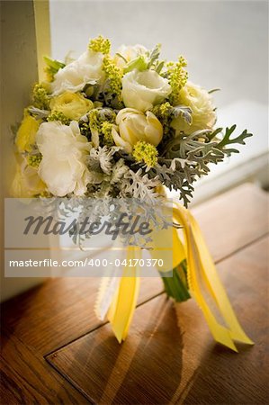 Image of a beautiful floral bouquet on wood table