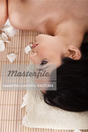 Beautiful woman getting spa treatment in a resort