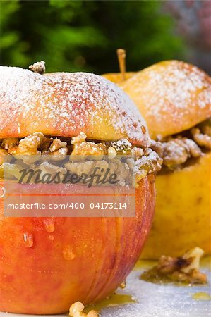 Close up of apples with honey and walnuts