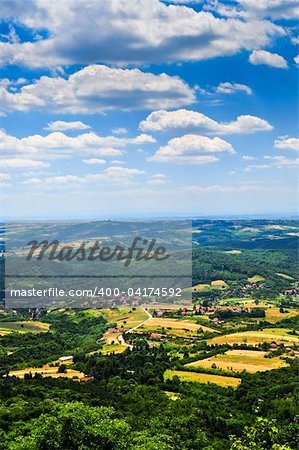 Landscape view of rural Serbian countryside with farms and towns