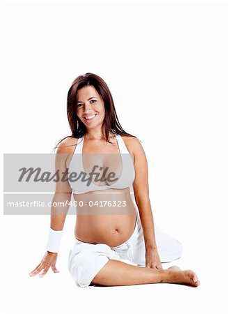 Pregnant woman making fitness exercises, isolated on white