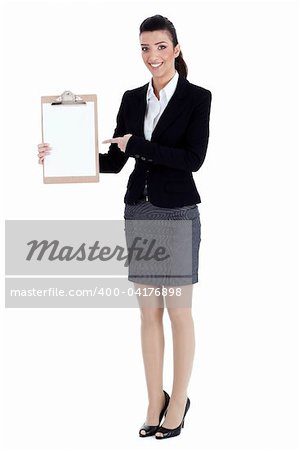 Full length of business woman pointing at the clipboard over white background