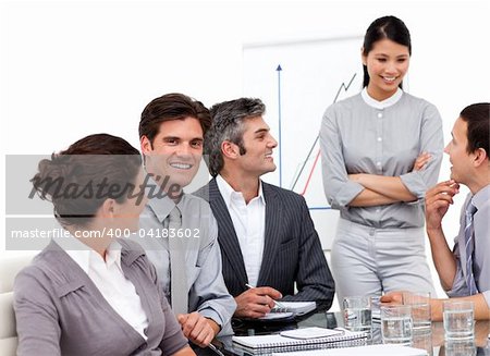 Portrait of successful business team during a presentation in a company