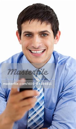 Attractive businessman sending a message isolated on a white background