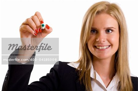 Business woman writing something with a green marker