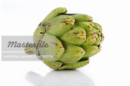Fresh cut baby artichoke on white background