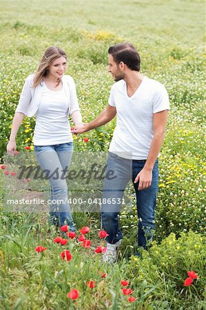 Couple in the park walking in the path way