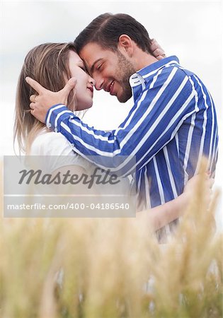 couple in love under the sky in the park