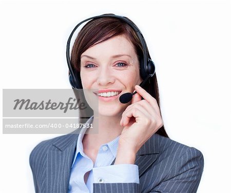 Portrait of a young businesswoman with headset on against white background