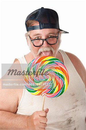 Fat man with thick glasses licking a lollipop