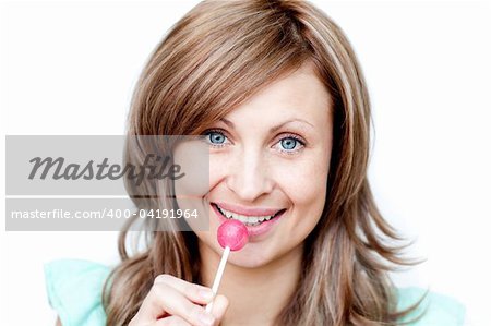 Attractive woman holding a lollipop against a white background