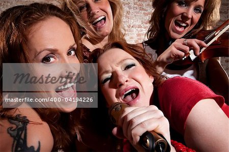 All-girl band performing in stylish clothing
