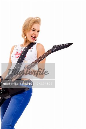 picture of a beautiful girl guitarist looking to a side