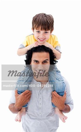 Jolly father giving his little boy piggyback ride against a white background