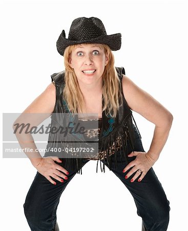 Middle-aged woman in biker outfit posing for a picture