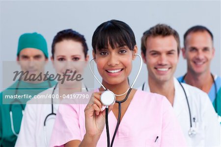 Portrait of a young medical team against a white background