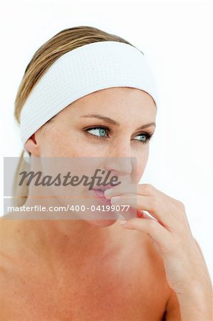 Pensive woman after having a spa treatment in a health care