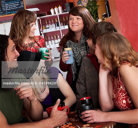 Friends catching up with each other at a cafe