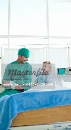 Surgeon discussing a patient case history in a hospital