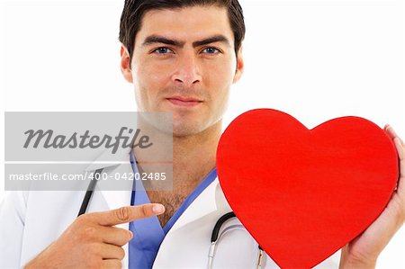 Stock image of Doctor pointing at red heart shape