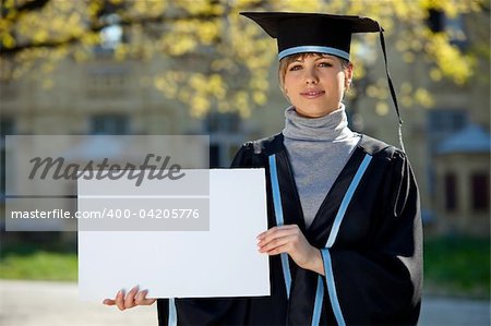 Portrait of young female graduate  with a clean sheet