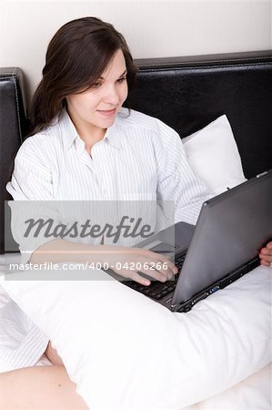 young adult woman in bed
