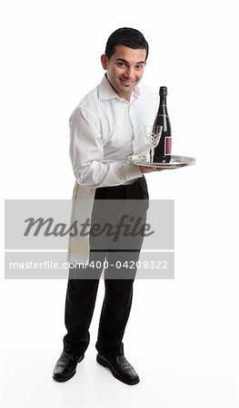A smiling friendly waiter, bartender, or domestic staff, holding or presenting a tray with a bottle of  wine and glasses.  White background.