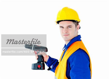 Assertive male worker holding a tool looking at the camera against white background