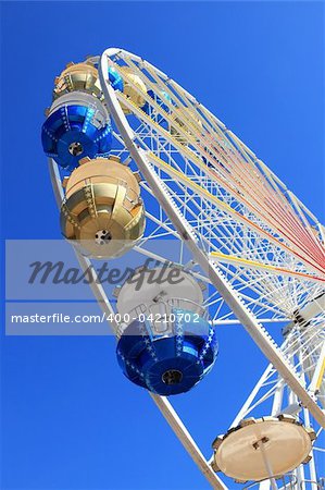 Detail of Merry-go-round against blue sky