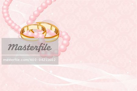 Wedding rings on the pink background