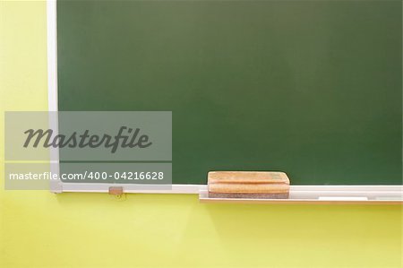 part of a blackboard with eraser