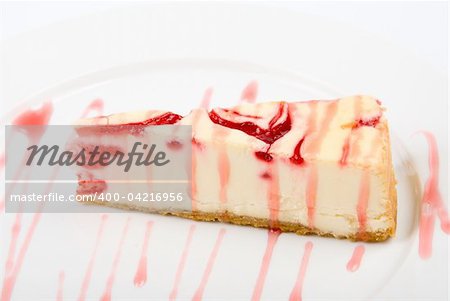 Cheesecake at plate on a white background