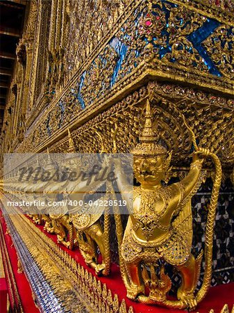 Gold Garuda in front of the church