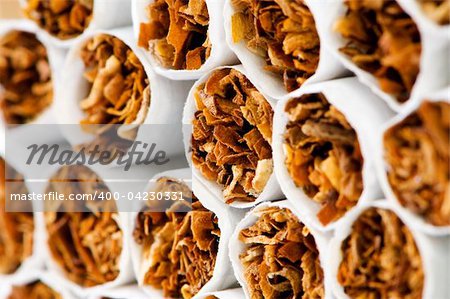 Close up of smoking cigarettes as antismoking concept