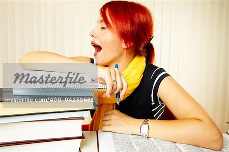 beautiful caucasian female student with books