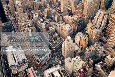 New York City Manhattan aerial skyline panorama view with skyscrapers and office buildings on street.