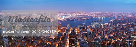 New York City Manhattan skyline aerial view panorama with Brooklyn and Hudson east river at sunset.