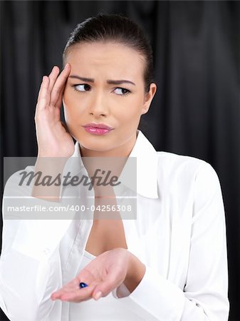 Portrait of beautiful woman she has headache