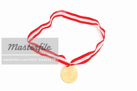 Golden medal isolated on the white background