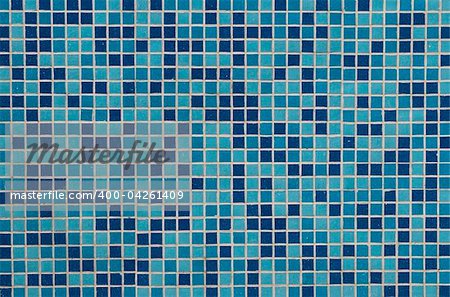 Abstract background of blue shaded tiles.