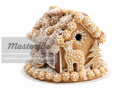 Christmas gingerbread house isolated on white background. Shallow dof