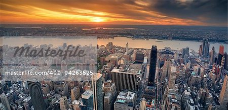 New York City Manhattan aerial panorama view with New Jersey from west Hudson River and skyscrapers at sunset.