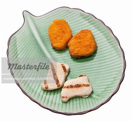 Chicken Nugget Choice of Breaded and Friend Nuggets vs. Baked Organic Nuggest.  Health and Food concept.  Isolated on White with a Clipping Path.