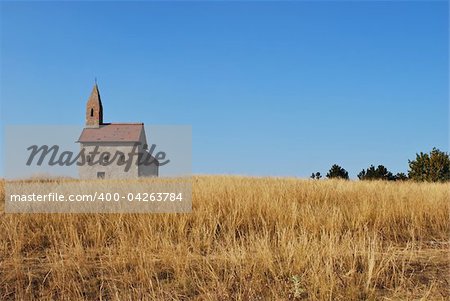 Grassy hill with the dominant Roman church building