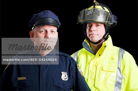 Police officer and fire fighter portrait on black.